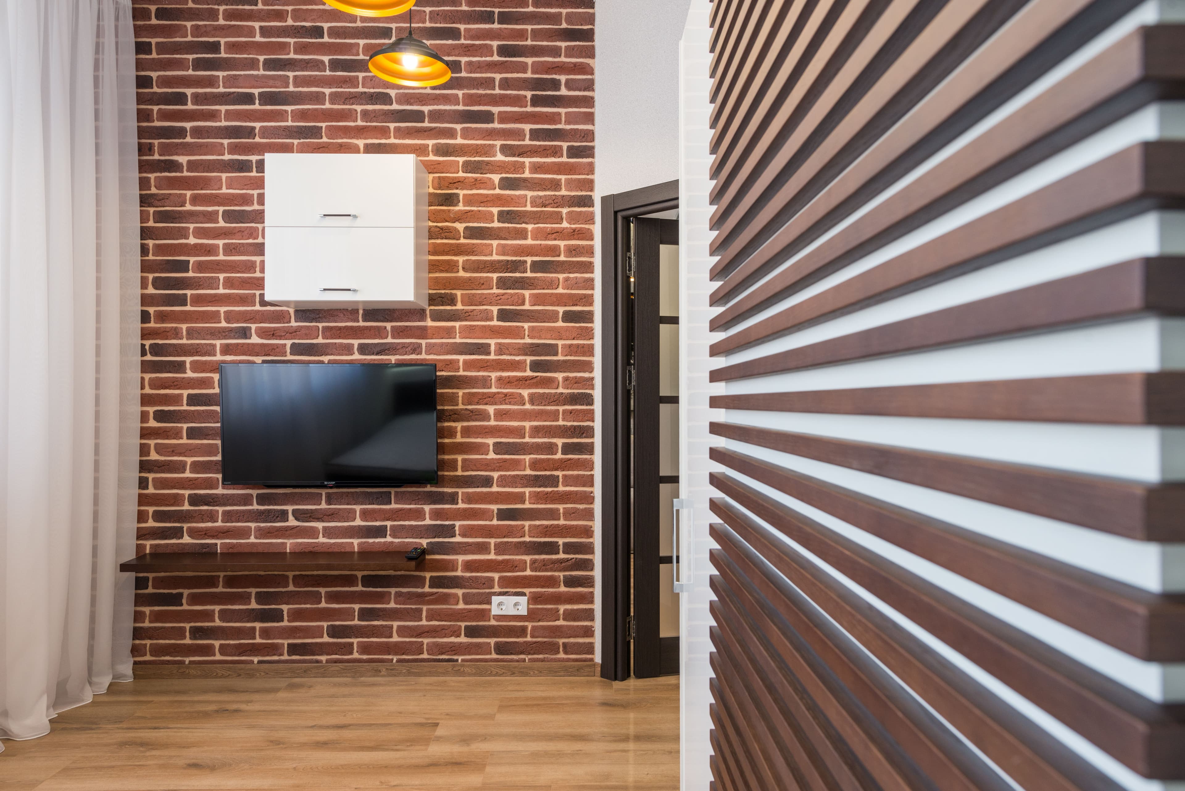 Folding partition wall